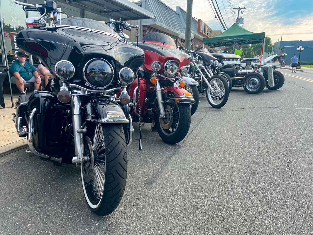 Motorcycles parked in a line